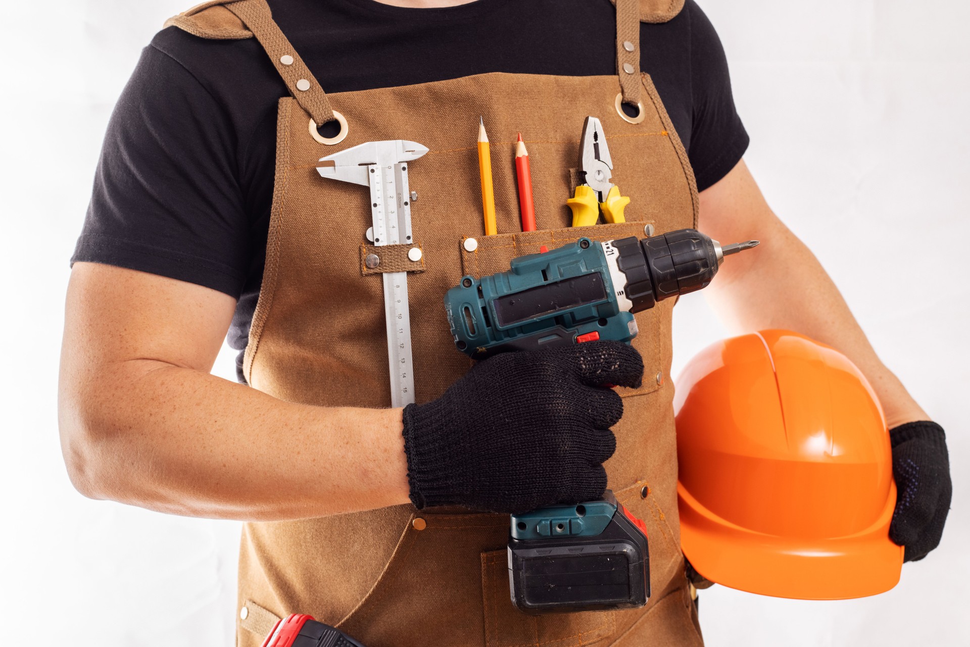 Handyman with Power Drill and Safety Gear